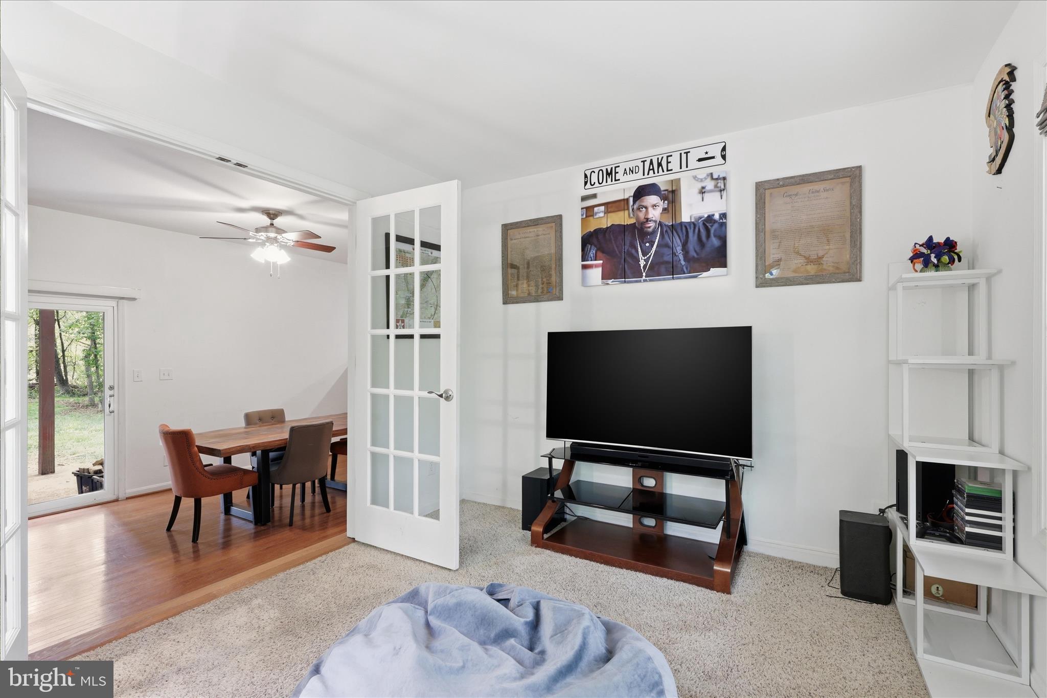 515 Shelton Shop Road Stafford, VA 22554 - Photo 22 of 52 a view of a livingroom with furniture and a flat screen tv