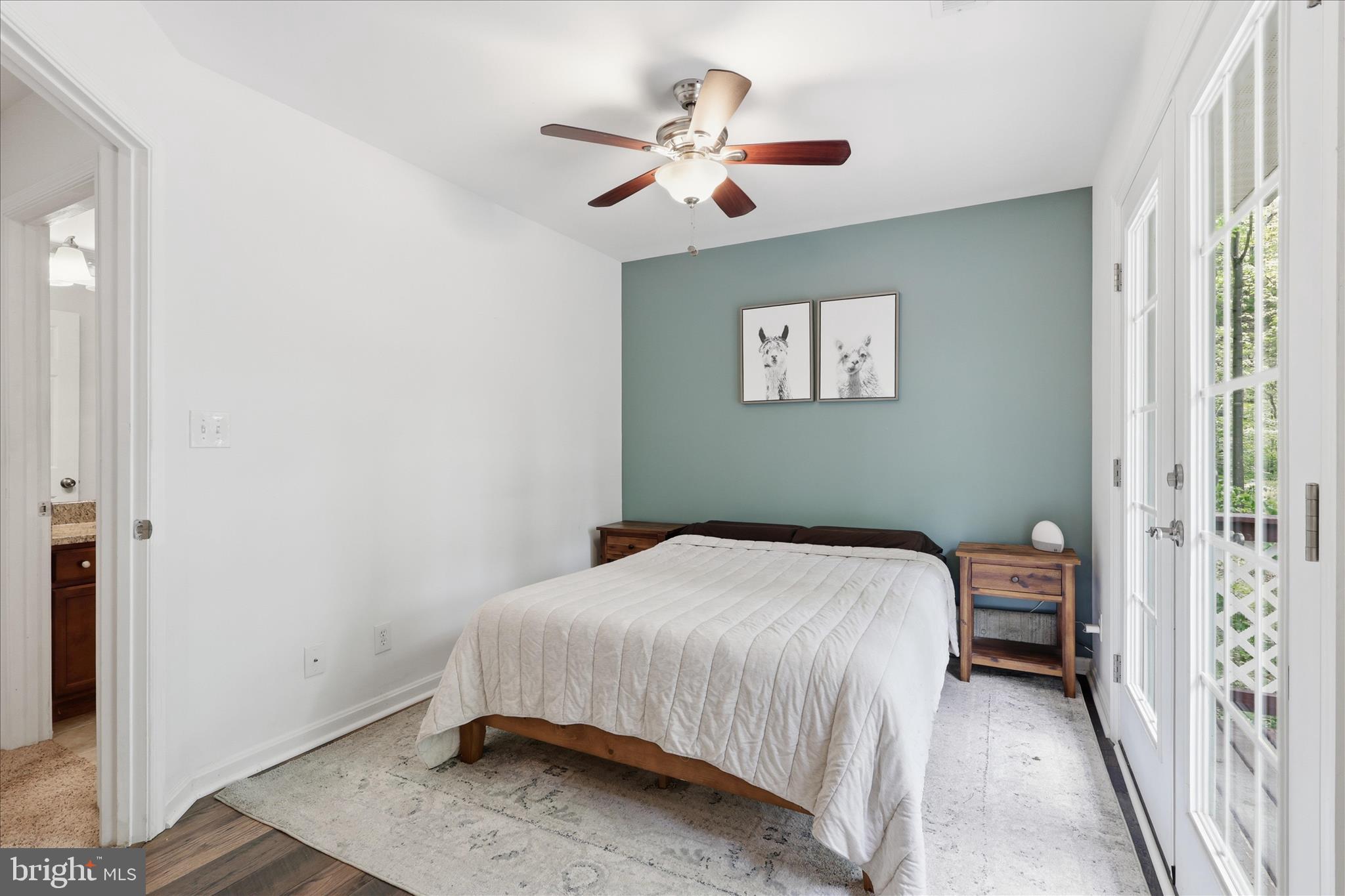 515 Shelton Shop Road Stafford, VA 22554 - Photo 28 of 52 a bedroom with a bed and a chandelier