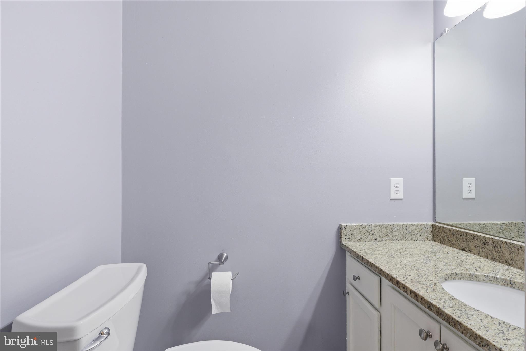 515 Shelton Shop Road Stafford, VA 22554 - Photo 34 of 52 a bathroom with a granite countertop sink and a mirror