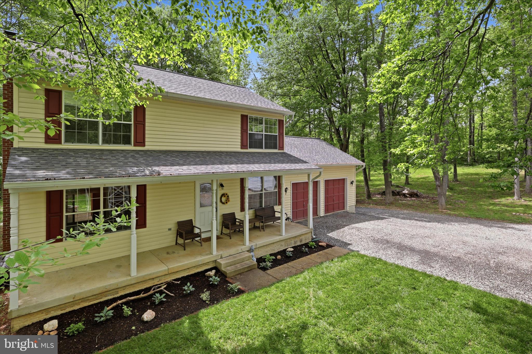 515 Shelton Shop Road Stafford, VA 22554 - Photo 4 of 52 a view of a house with backyard tub and a tree