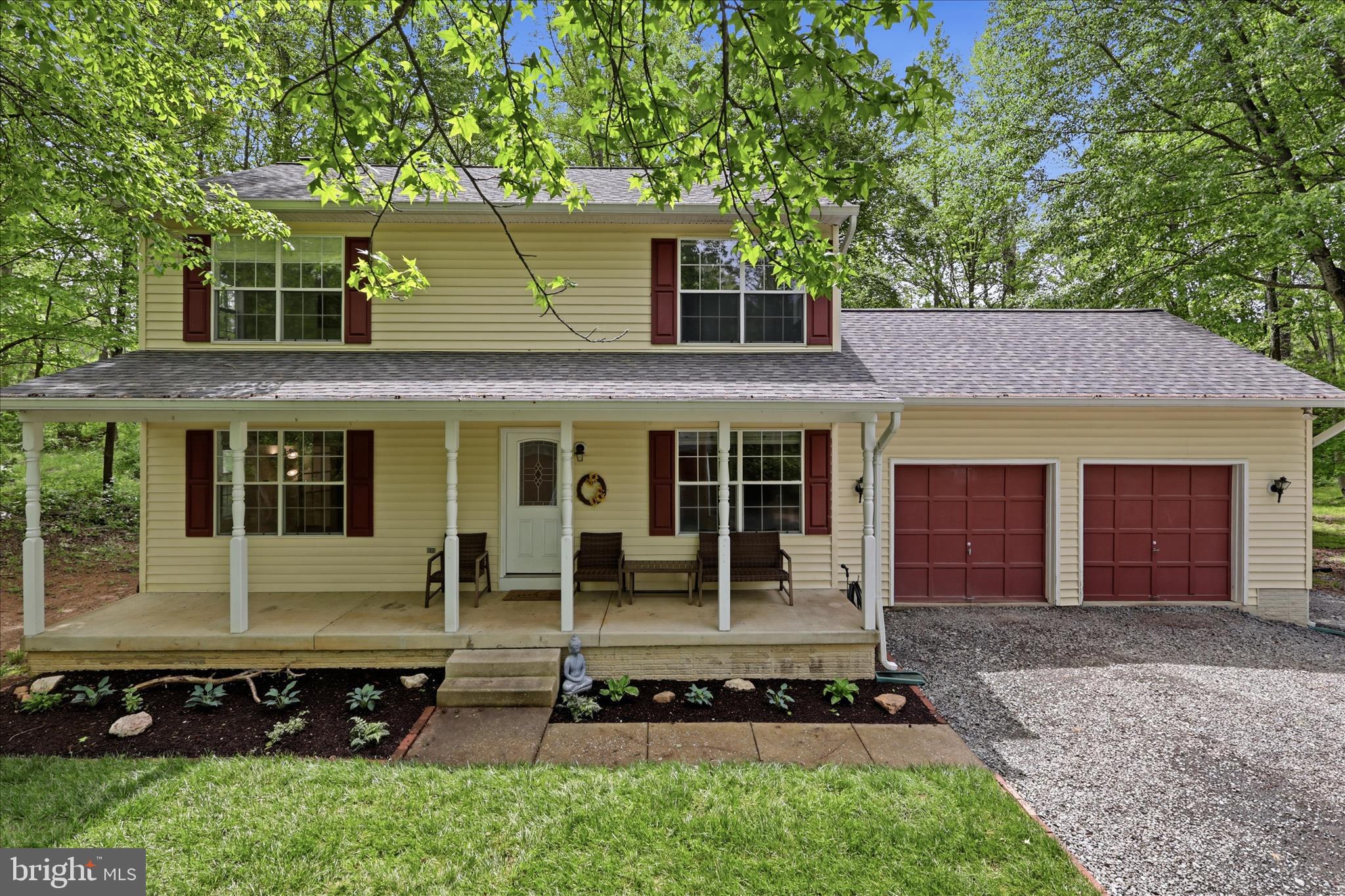 515 Shelton Shop Road Stafford, VA 22554 - Photo 5 of 52 a front view of a house with a yard