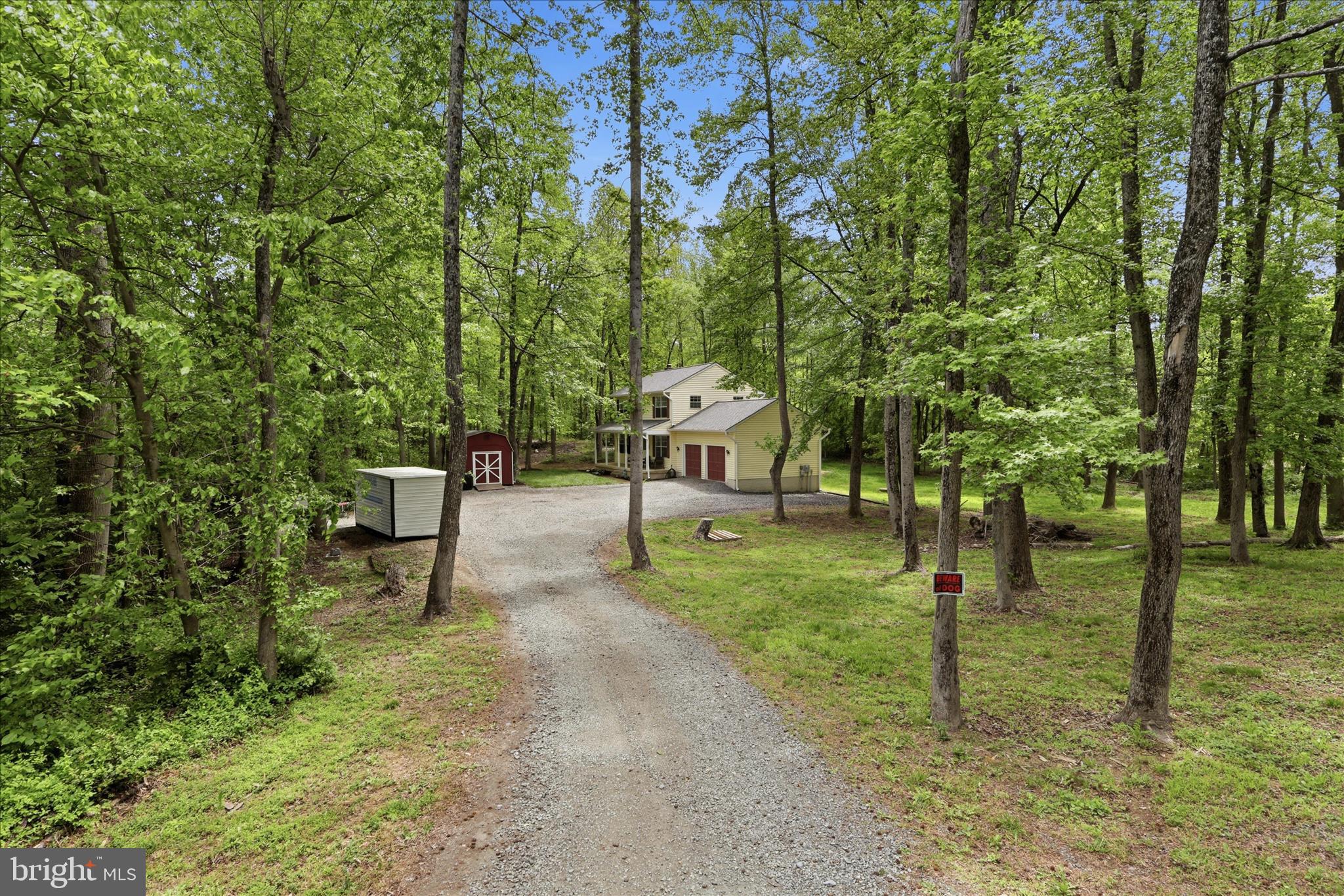 515 Shelton Shop Road Stafford, VA 22554 - Photo 7 of 52 a green field with lots of trees