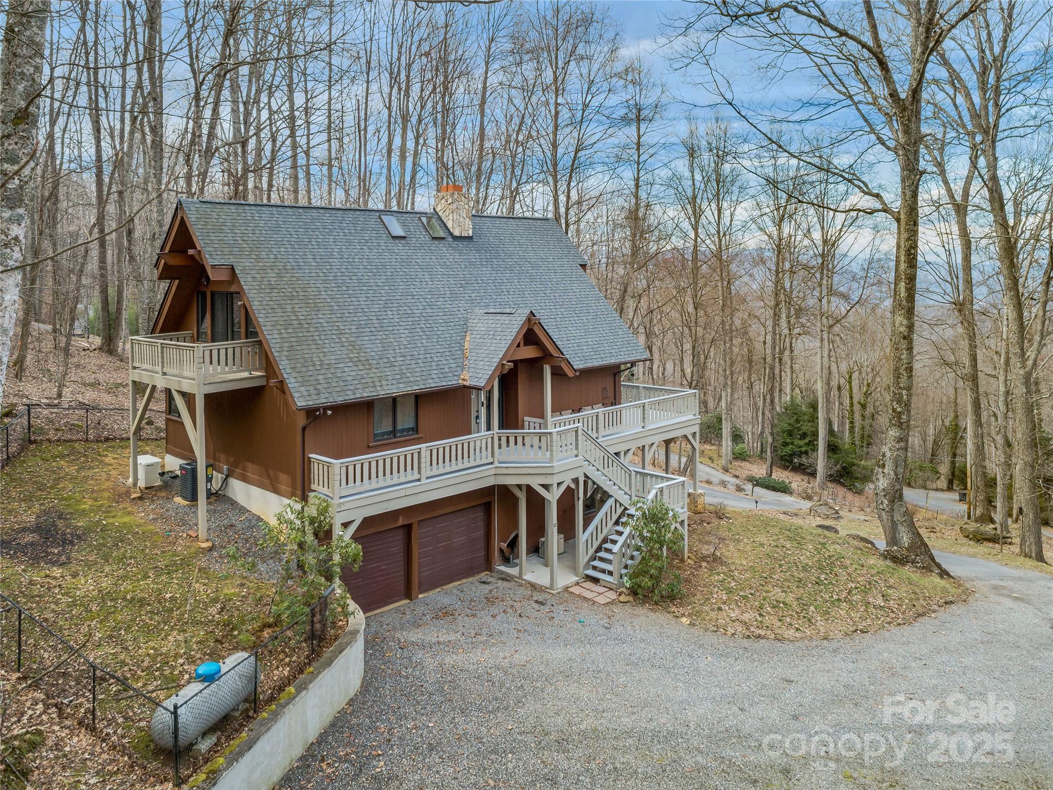 21 Brandywine Road Waynesville, NC 28786 - Photo 6 of 48 a front view of a house with a yard