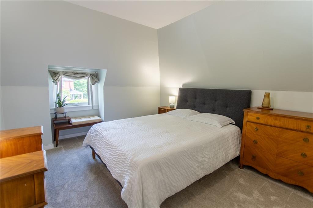 3211 Willett Road Pittsburgh, PA 15227 - Photo 17 of 27 a bedroom with a bed and window