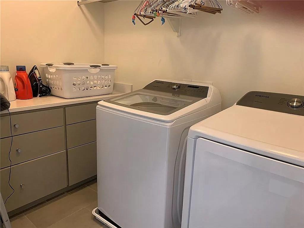 2519 Sutherland Street Austin, TX 78746 - Photo 13 of 14 a utility room with dryer and washer