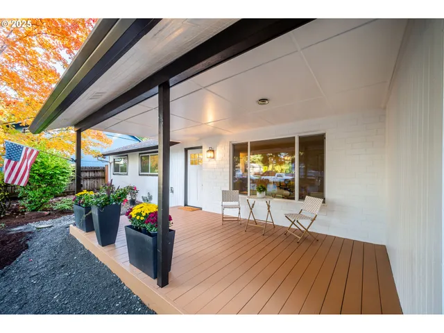 a view of an outdoor dining space with a patio