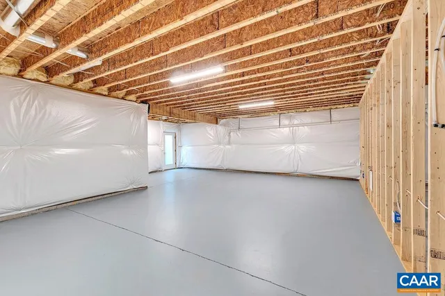 a view of an empty room with stairs