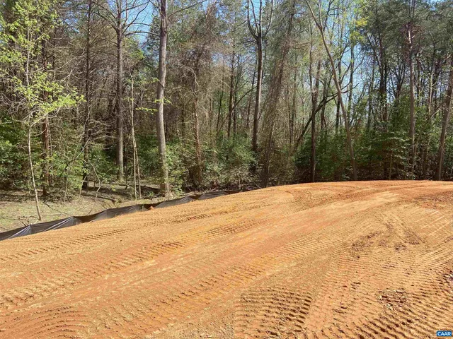a view of a lake with lots of trees