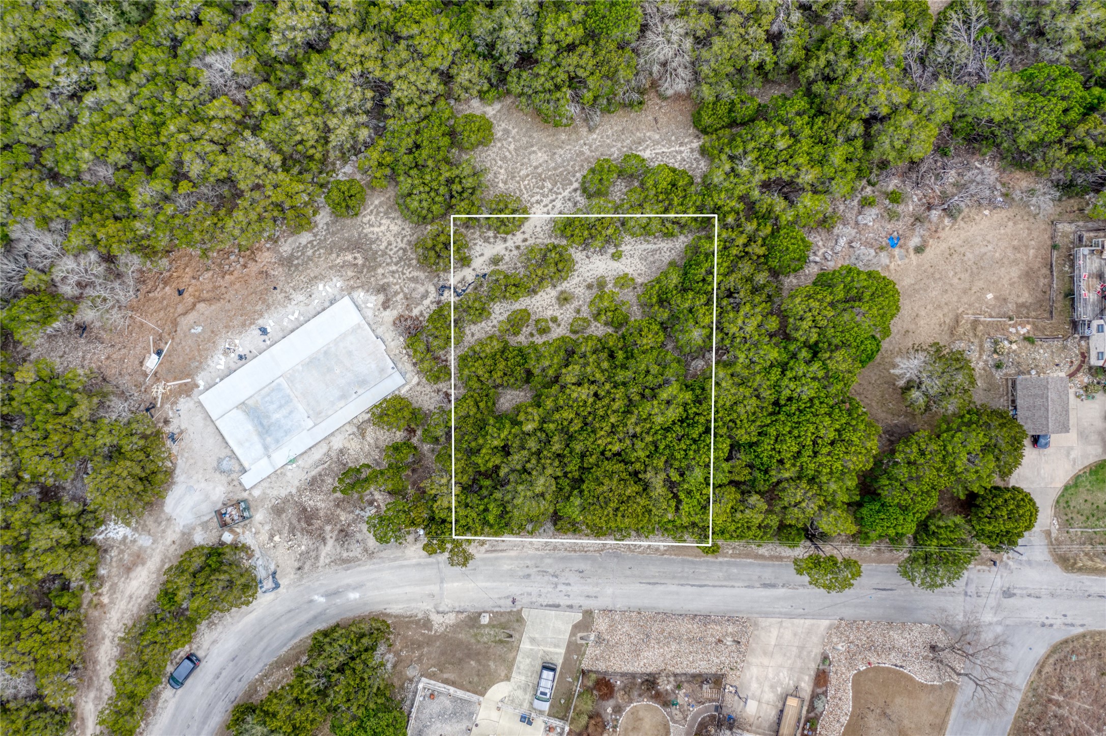 20702 N Ridge Lago Vista, TX 78645 - Photo 5 of 16 an aerial view of a house with a yard and greenery space