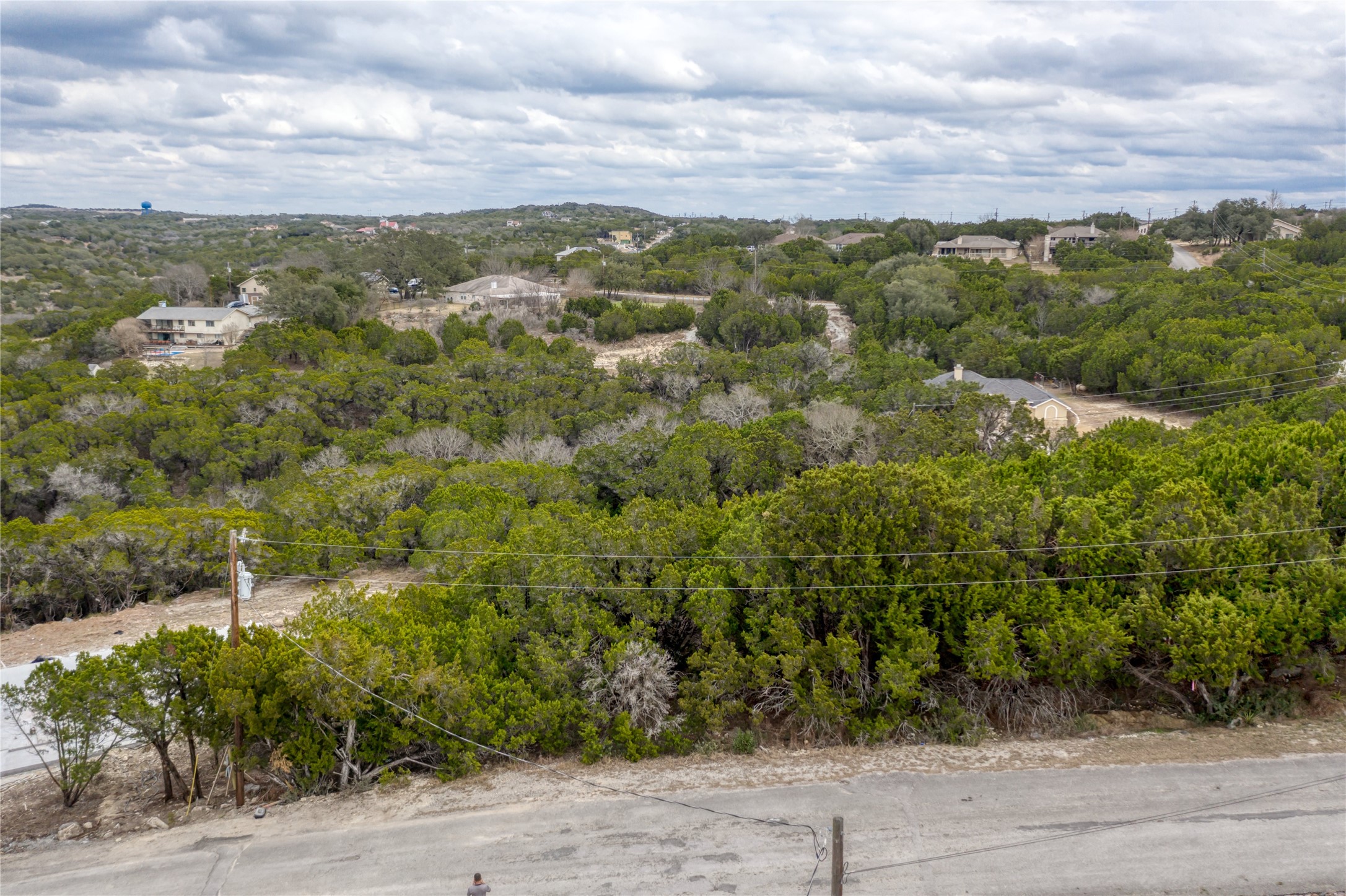 20702 N Ridge Lago Vista, TX 78645 - Photo 7 of 16 an aerial view of residential houses with outdoor space and trees