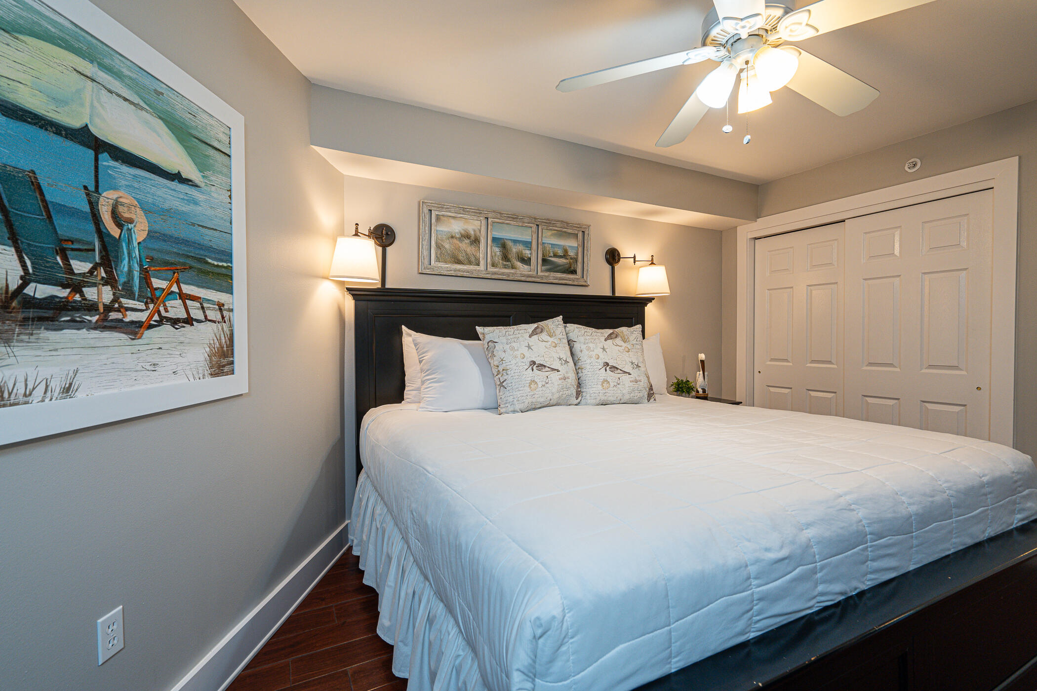 895 Santa Rosa Boulevard, Unit 308 Fort Walton Beach, FL 32548 - Photo 17 of 31 a bedroom with a bed and a chandelier