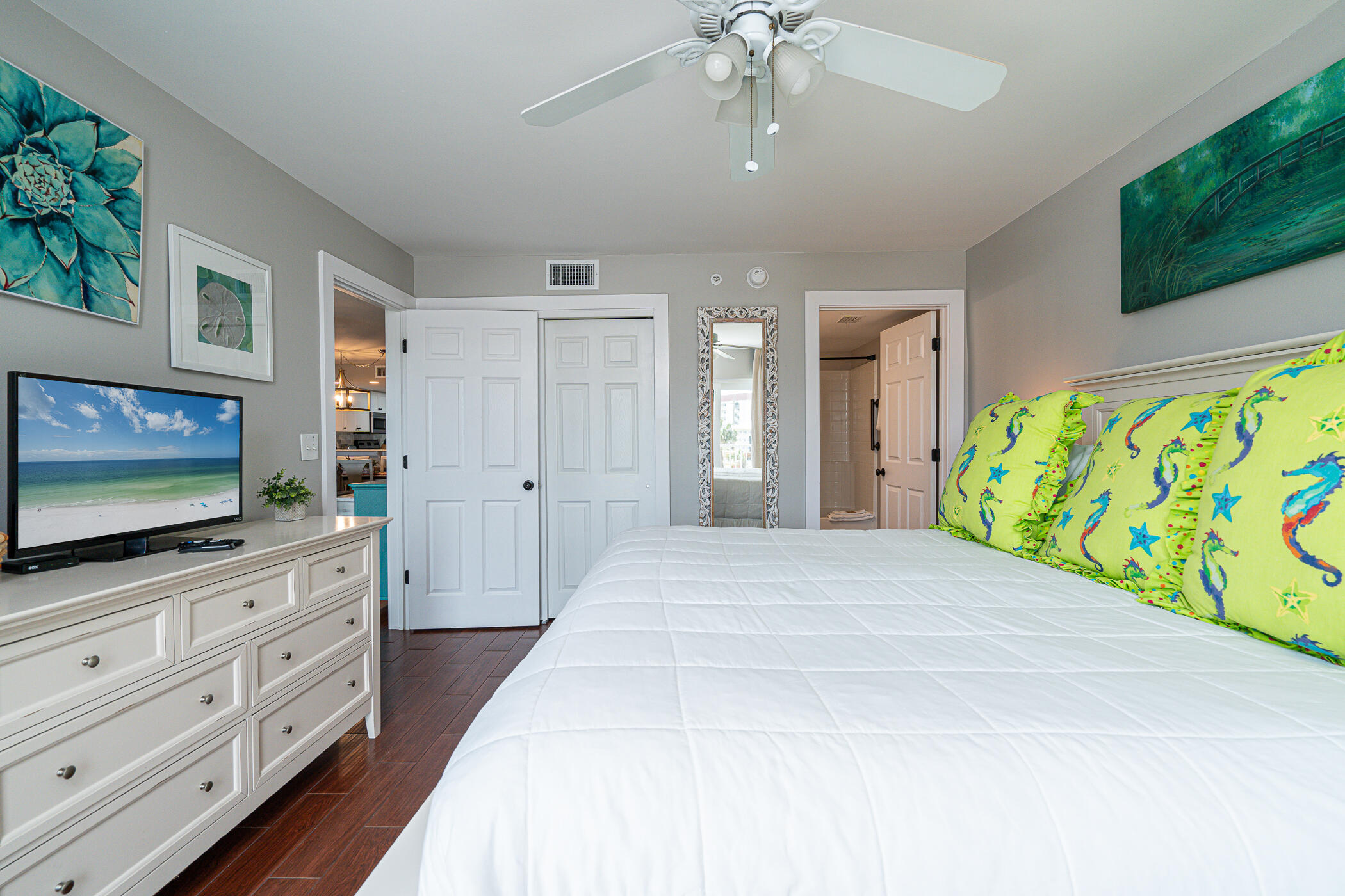 895 Santa Rosa Boulevard, Unit 308 Fort Walton Beach, FL 32548 - Photo 20 of 31 a bedroom with a bed and a flat screen tv