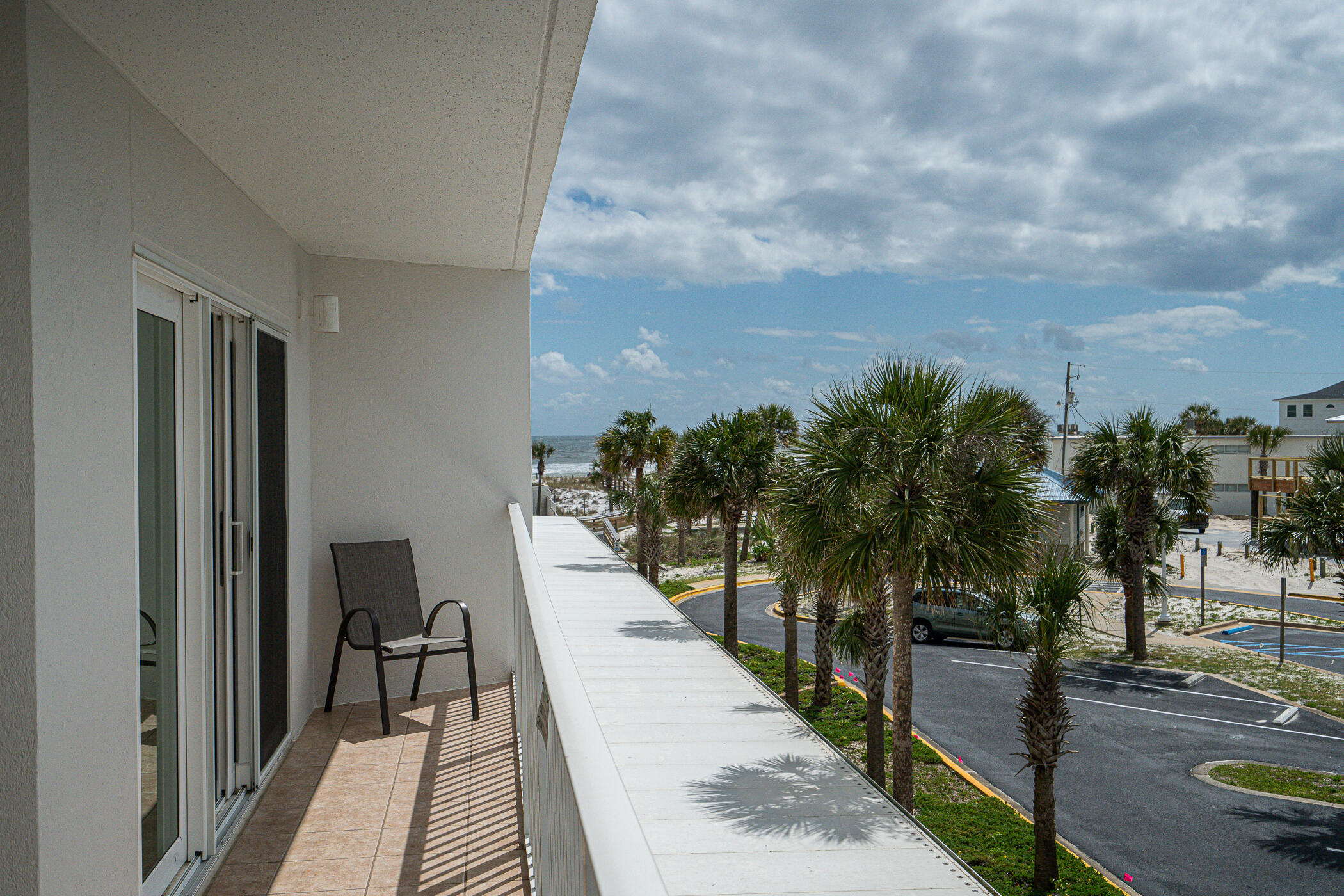 895 Santa Rosa Boulevard, Unit 308 Fort Walton Beach, FL 32548 - Photo 22 of 31 a view of a swimming pool with an outdoor seating