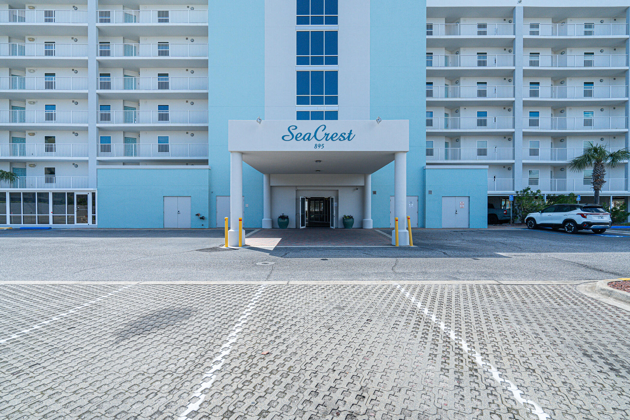 895 Santa Rosa Boulevard, Unit 308 Fort Walton Beach, FL 32548 - Photo 25 of 31 a view of a building with a bench