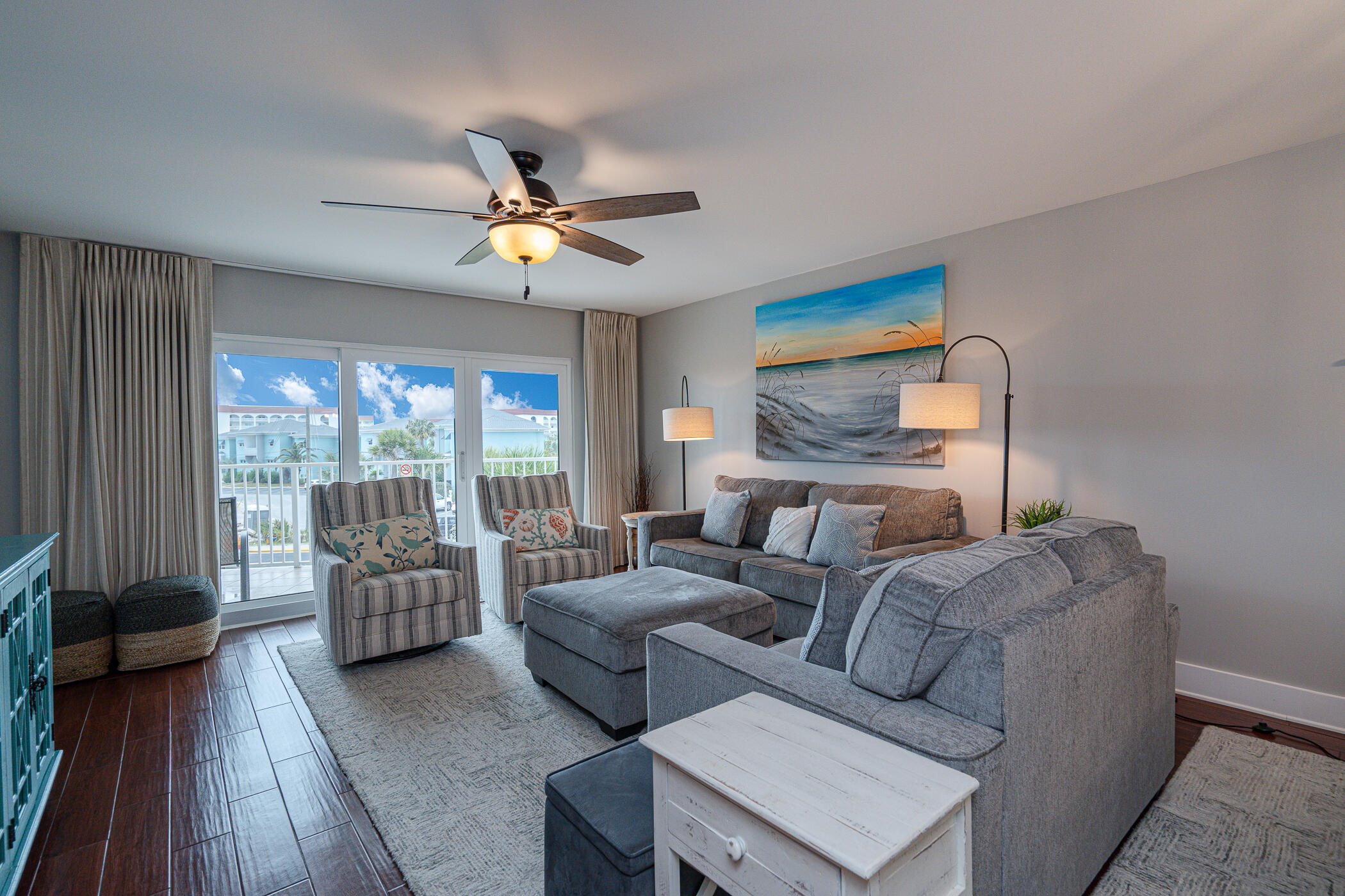 895 Santa Rosa Boulevard, Unit 308 Fort Walton Beach, FL 32548 - Photo 9 of 31 a living room with furniture and a large window