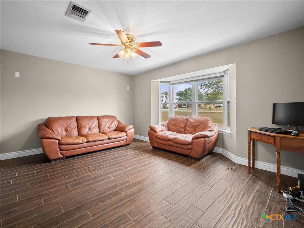 782 Santa Clara Loop Marion, TX 78124 - Photo 47 of 48 a living room with furniture and a flat screen tv