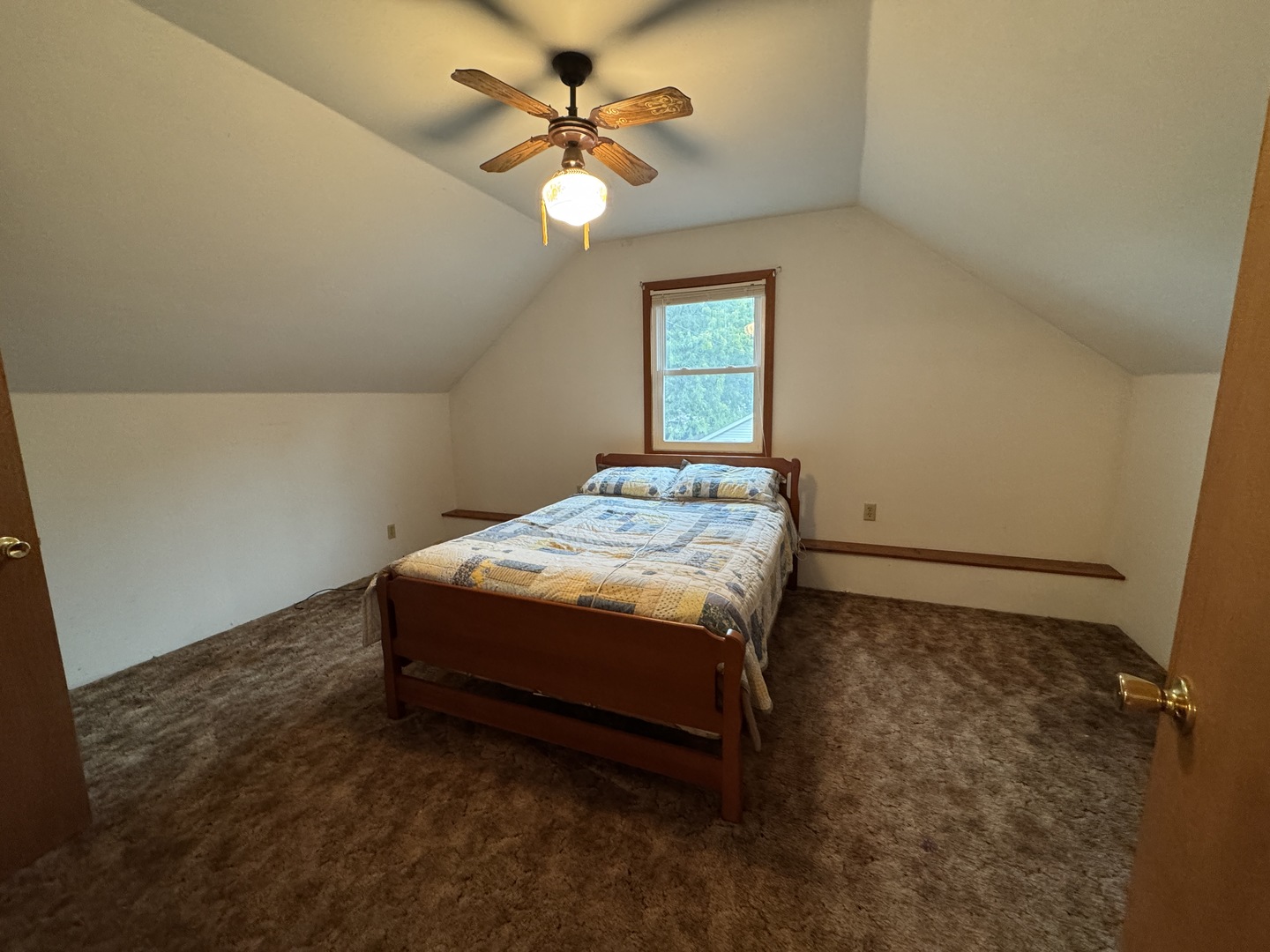 138 North Brown Street Genoa, IL 60135 - Photo 20 of 30 a bedroom with a bed and a window
