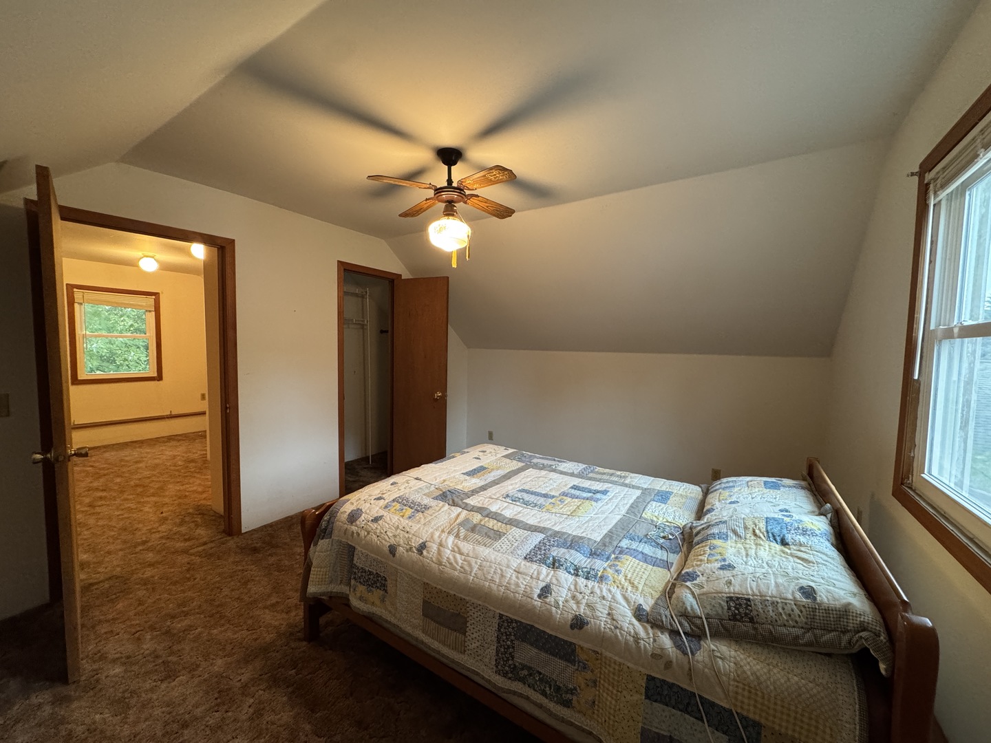 138 North Brown Street Genoa, IL 60135 - Photo 21 of 30 a bedroom with a bed and a window