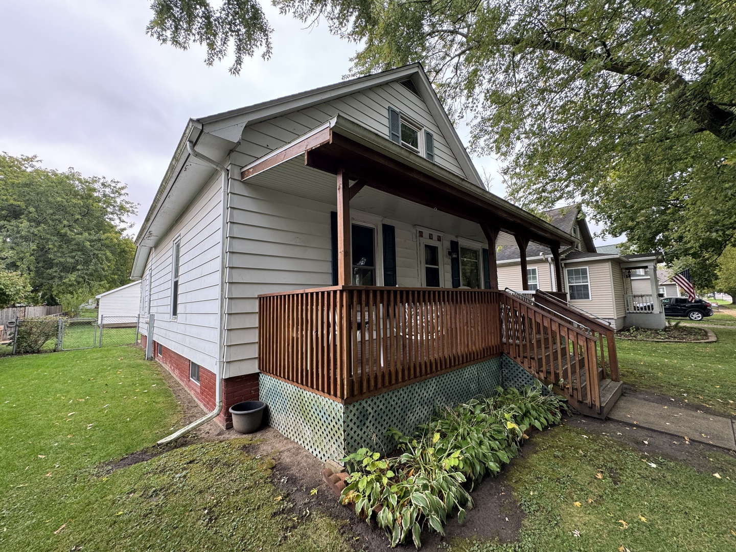 138 North Brown Street Genoa, IL 60135 - Photo 29 of 30 a front view of a house with garden