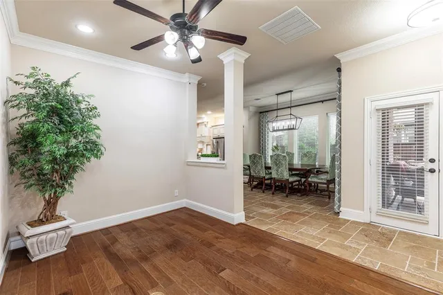 a view of livingroom with furniture and a potted plant