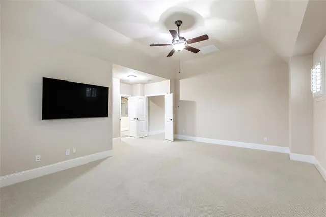 a view of a livingroom with a flat screen tv