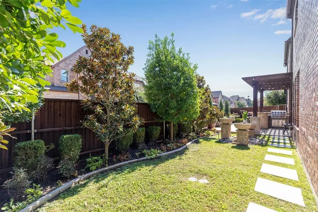 a view of a swimming pool with sitting area