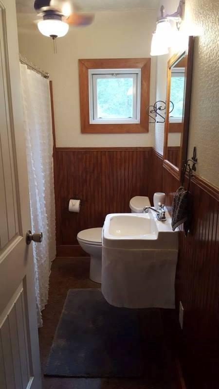 2412 Dugspur Road Callaway, VA 24067 - Photo 17 of 35 a bathroom with a sink and a mirror