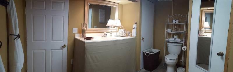 2412 Dugspur Road Callaway, VA 24067 - Photo 27 of 35 a bathroom with a sink and a mirror