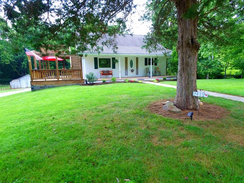 2412 Dugspur Road Callaway, VA 24067 - Photo 4 of 35 a house view with a sitting space and garden
