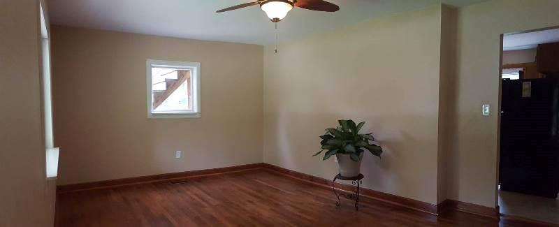 2412 Dugspur Road Callaway, VA 24067 - Photo 10 of 35 wooden floor in an empty room with a window