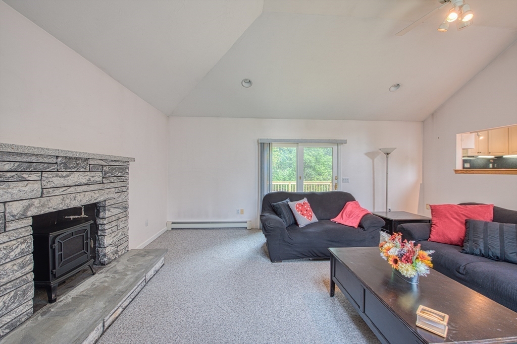 7 Tisdale Road Sharon, MA 02067 - Photo 7 of 37 a living room with furniture and a fireplace