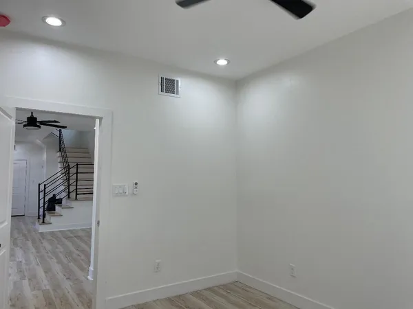 a bathroom with a toilet sink and shower
