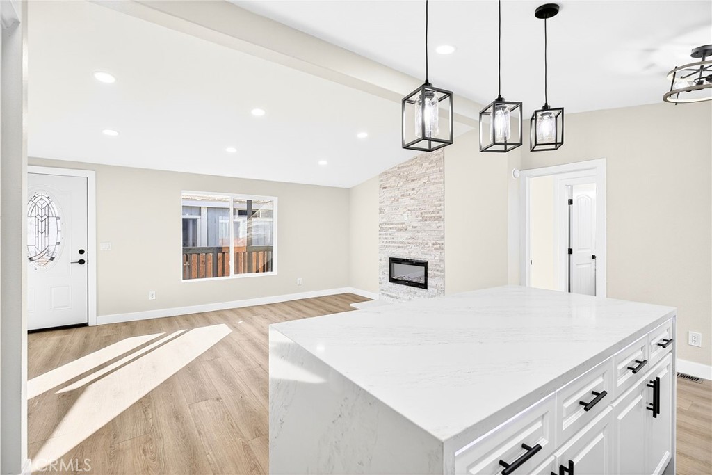 80 Dawes Street, Unit 88 Perris, CA 92571 - Photo 11 of 29 a kitchen with a stove a sink and dishwasher