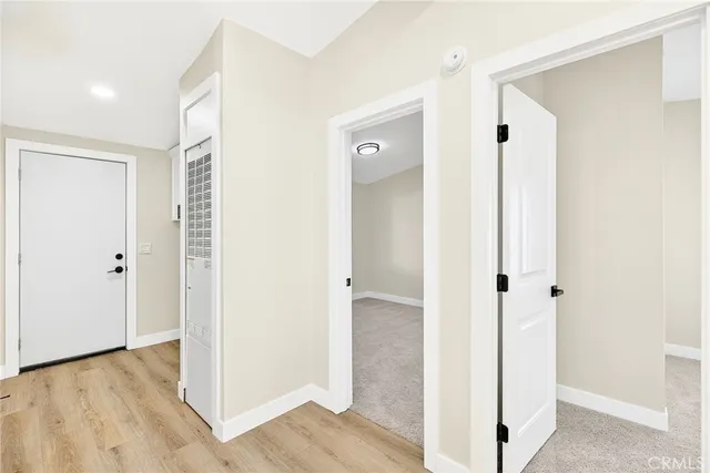 a view of a bathroom with wooden floor