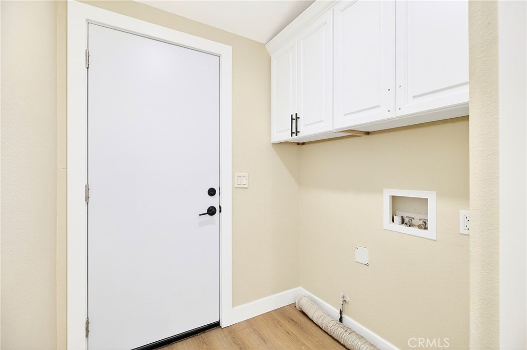 80 Dawes Street, Unit 88 Perris, CA 92571 - Photo 13 of 29 a view of a closet area with wooden floor