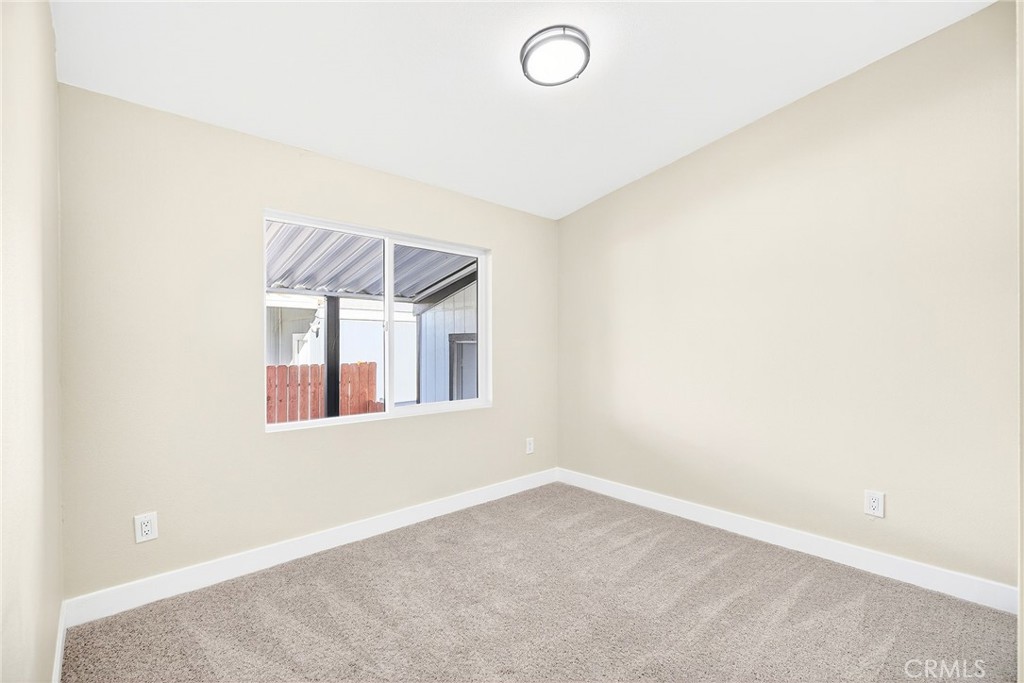 80 Dawes Street, Unit 88 Perris, CA 92571 - Photo 14 of 29 an empty room with windows