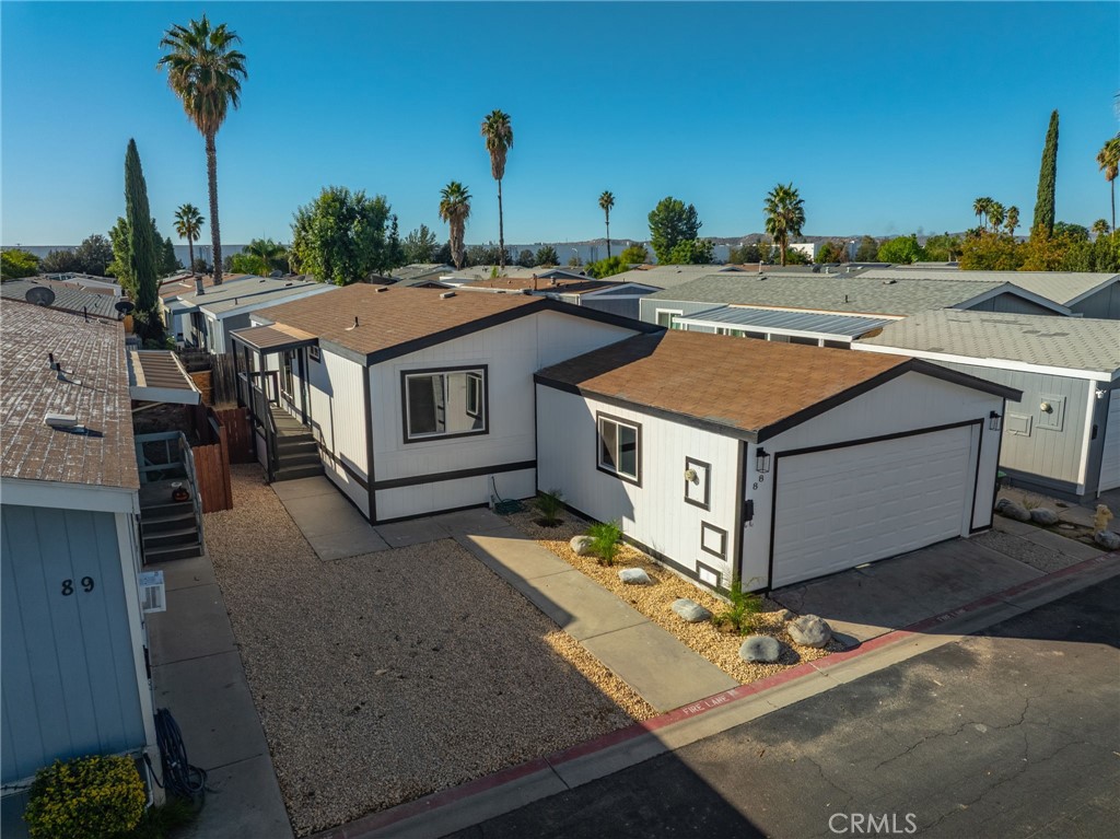 80 Dawes Street, Unit 88 Perris, CA 92571 - Photo 23 of 29 an aerial view of a house with a yard