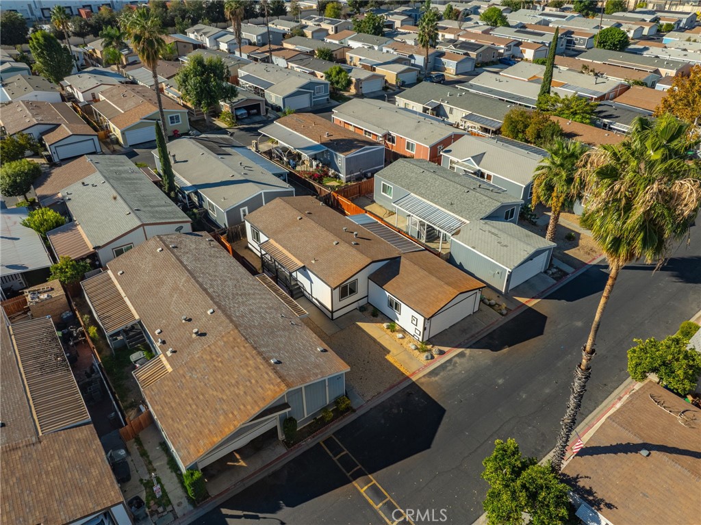 80 Dawes Street, Unit 88 Perris, CA 92571 - Photo 25 of 29 an aerial view of a residential houses with outdoor space