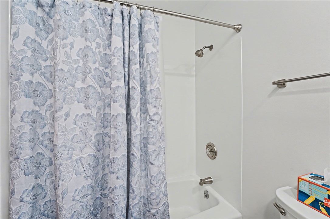 4919 Silver Arrow Drive Riverside, OH 45424 - Photo 25 of 57 This clean and inviting bathroom features a classic shower and tub combination.