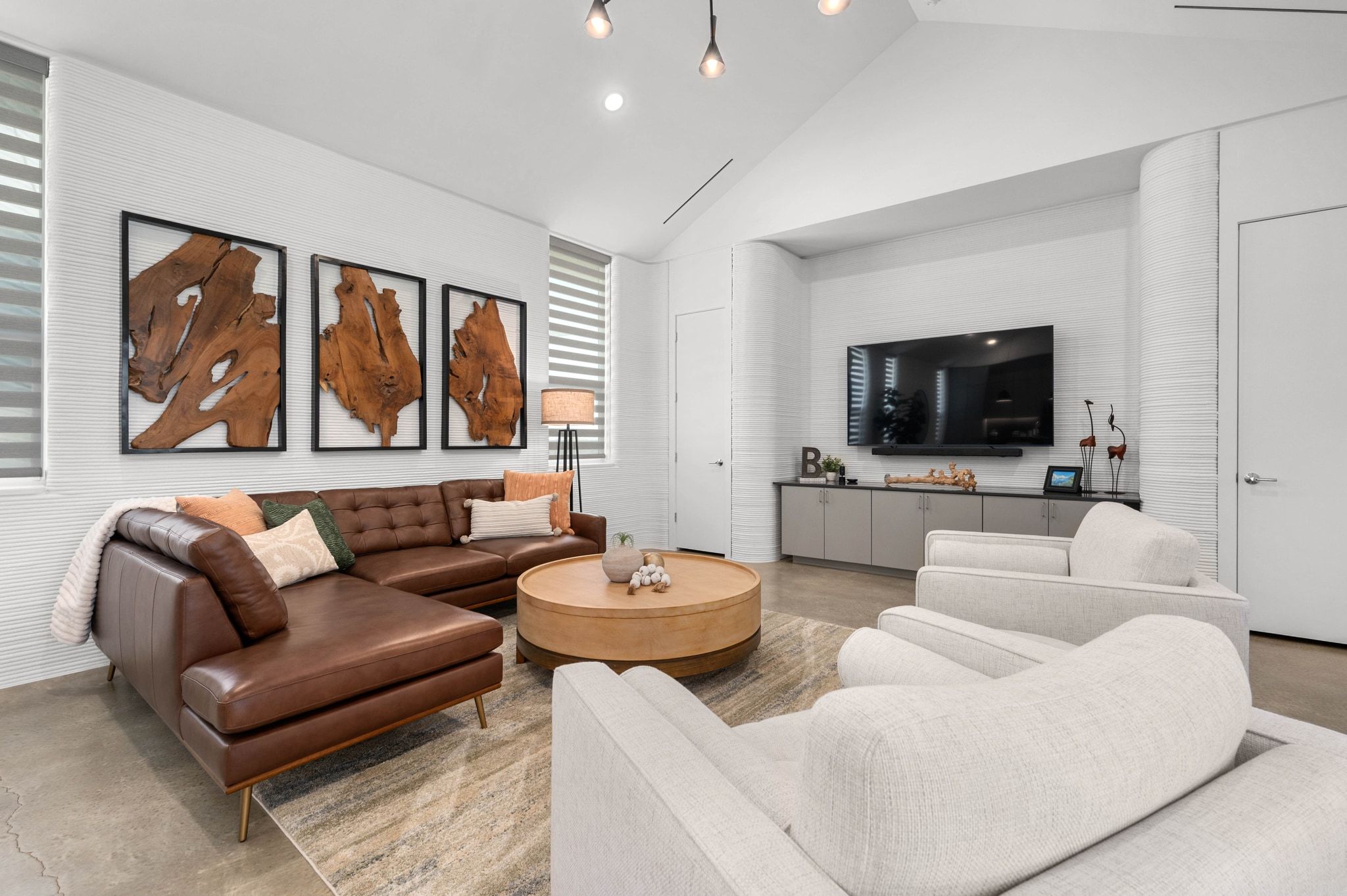 221 Lone Ranger Trail Georgetown, TX 78628 - Photo 12 of 35 a living room with furniture a flat screen tv and a window