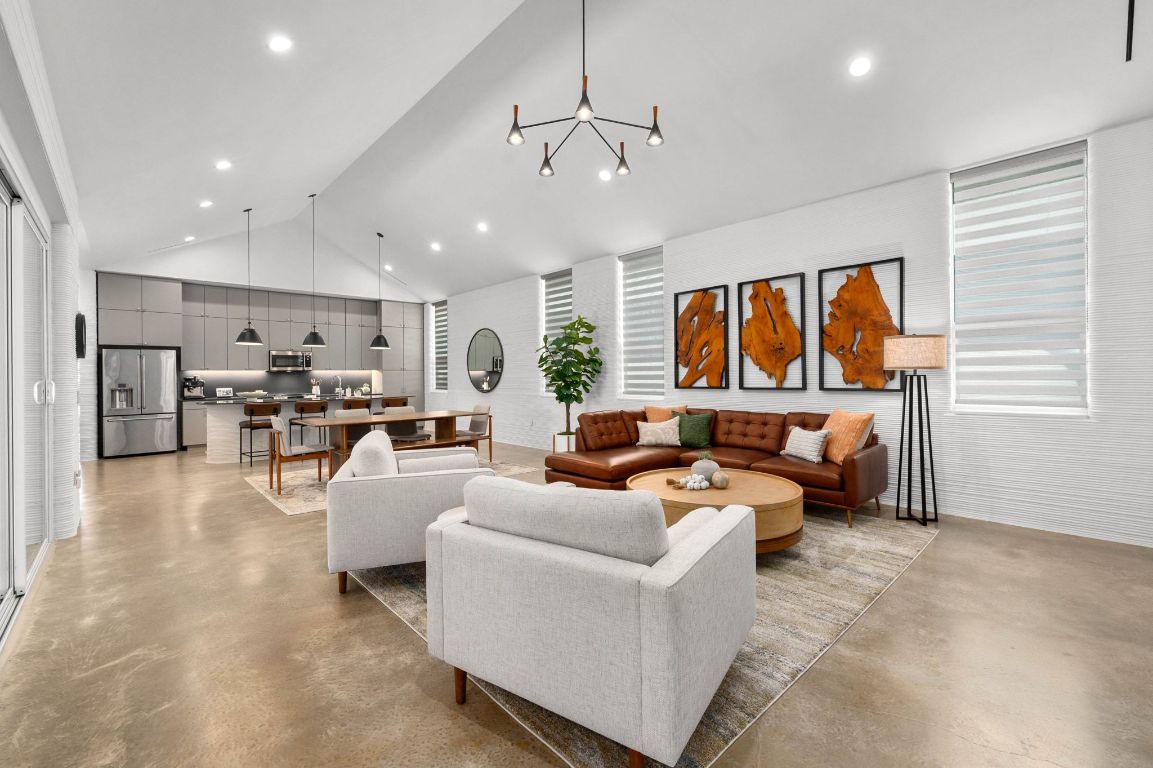 221 Lone Ranger Trail Georgetown, TX 78628 - Photo 13 of 35 a living room with furniture kitchen view and a window