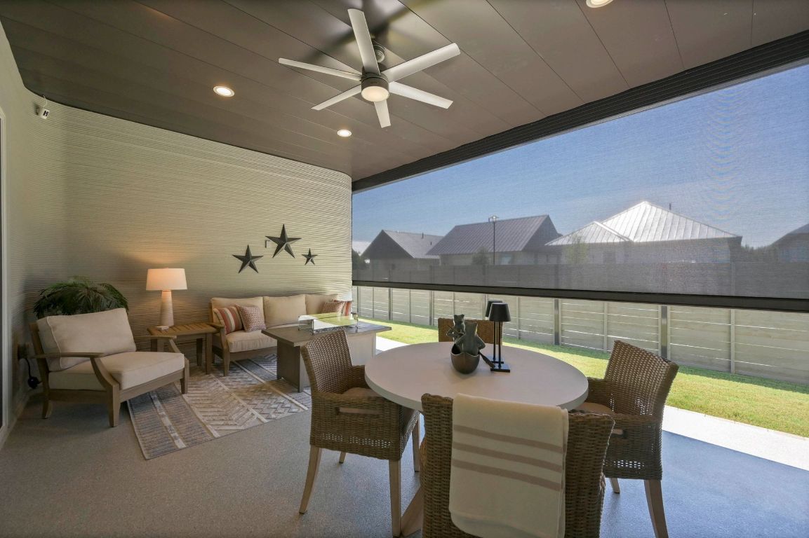 221 Lone Ranger Trail Georgetown, TX 78628 - Photo 23 of 35 a view of a dining room with furniture window and outside view