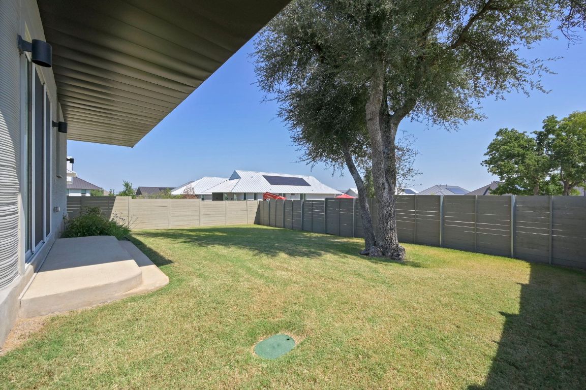 221 Lone Ranger Trail Georgetown, TX 78628 - Photo 26 of 35 a view of backyard with wooden fence