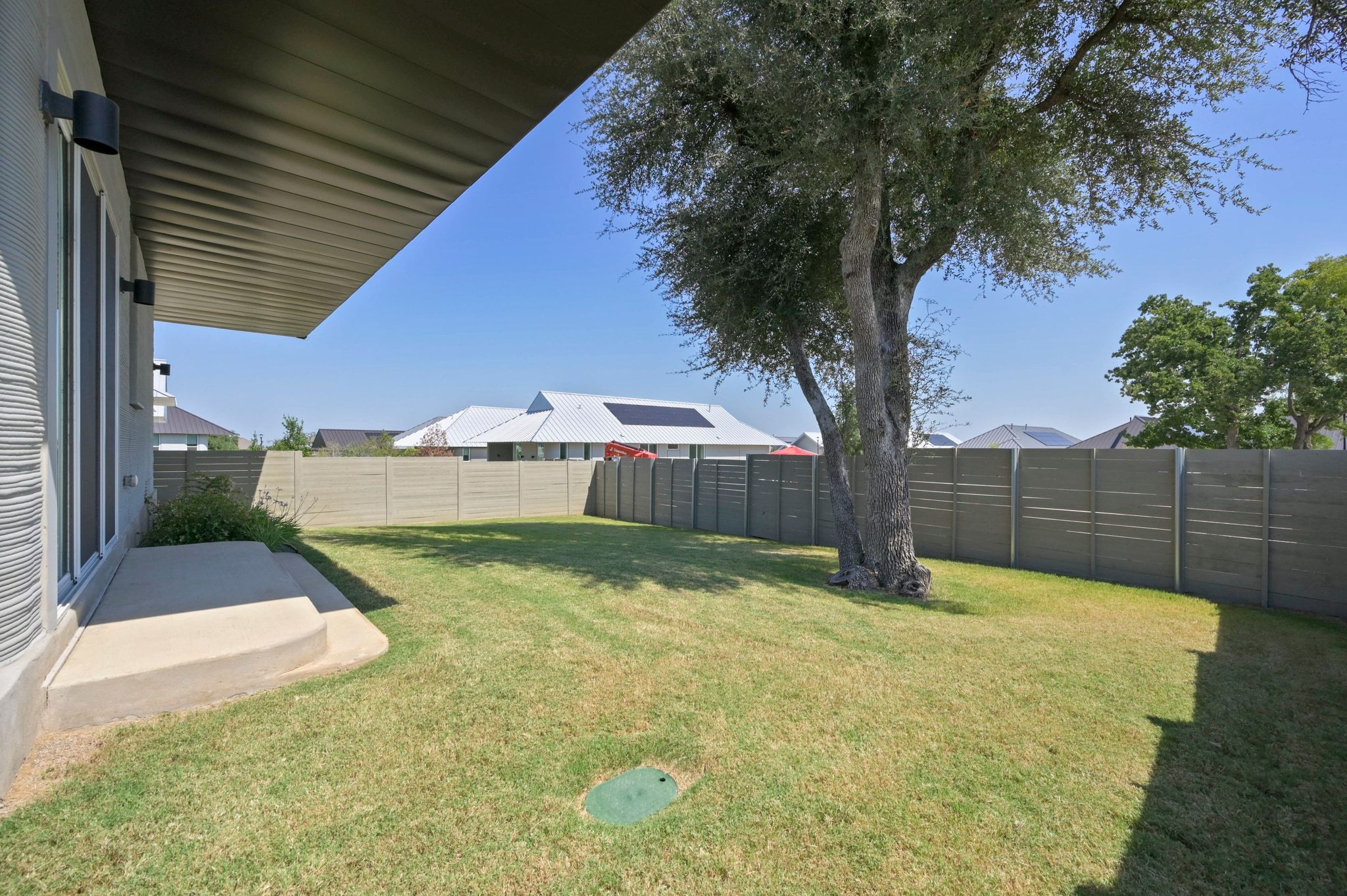 221 Lone Ranger Trail Georgetown, TX 78628 - Photo 26 of 35 a view of backyard with wooden fence