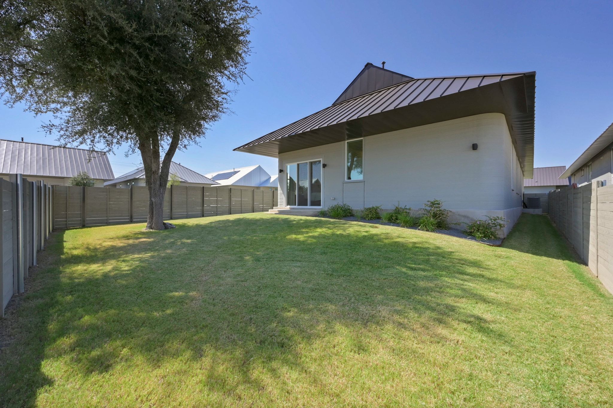 221 Lone Ranger Trail Georgetown, TX 78628 - Photo 28 of 35 a front view of house with yard and trees
