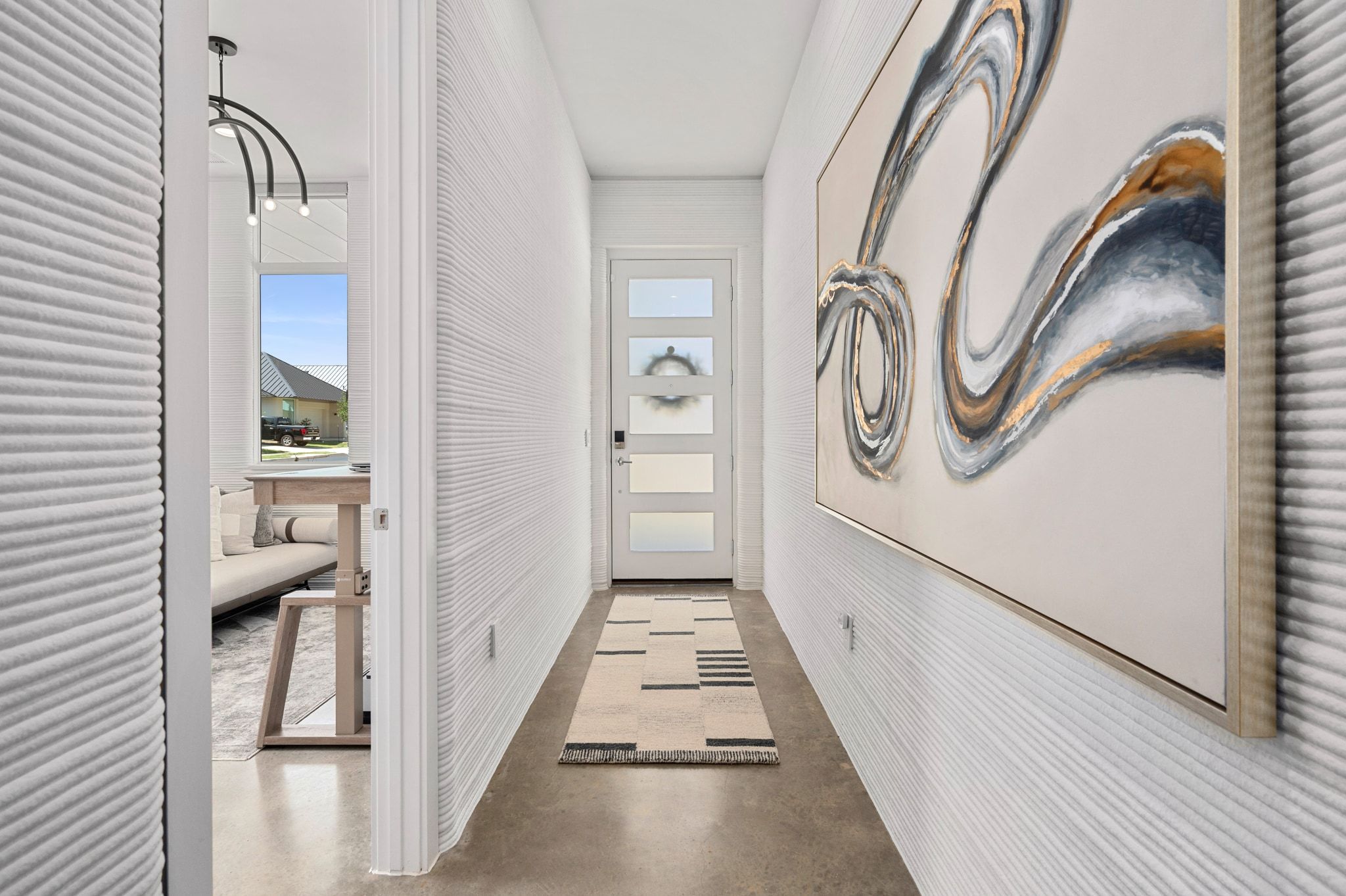 221 Lone Ranger Trail Georgetown, TX 78628 - Photo 4 of 35 a view of a hallway with furniture and stairs