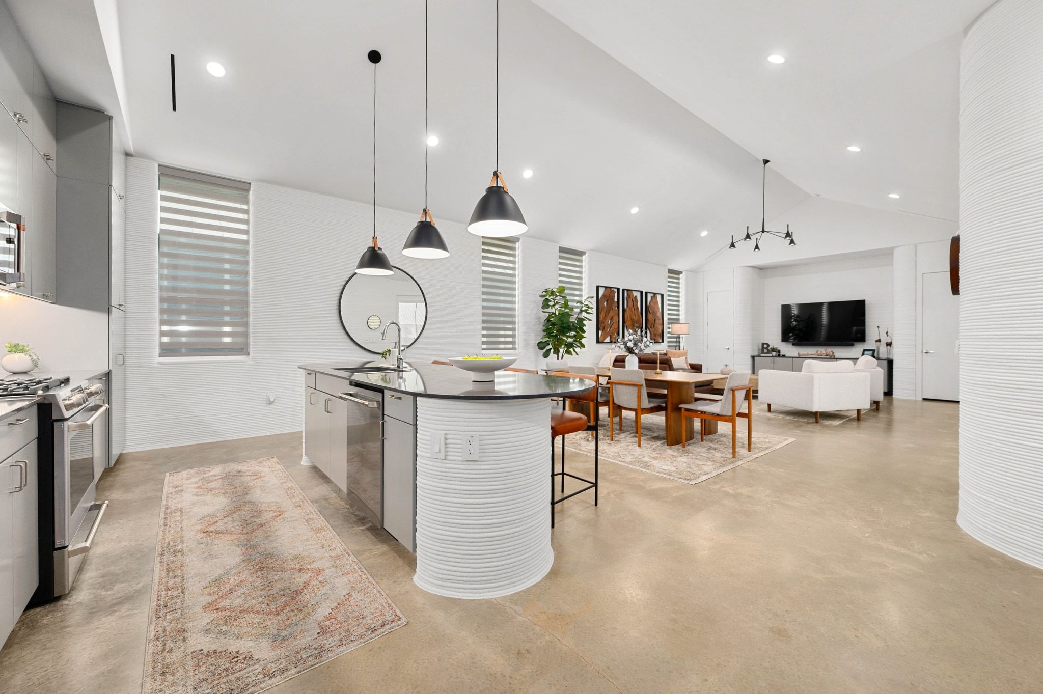 221 Lone Ranger Trail Georgetown, TX 78628 - Photo 6 of 35 a living room with furniture a flat screen tv and a fireplace