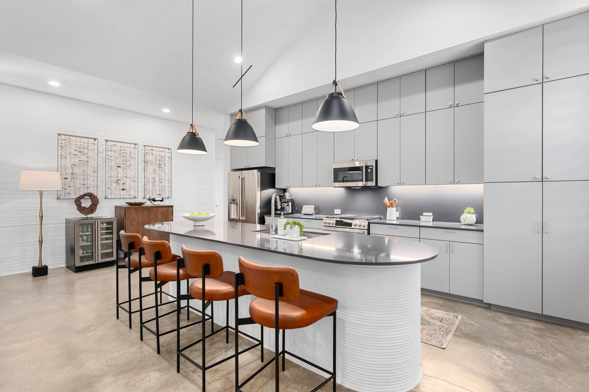 221 Lone Ranger Trail Georgetown, TX 78628 - Photo 9 of 35 a kitchen with stainless steel appliances granite countertop a sink a stove a table and chairs