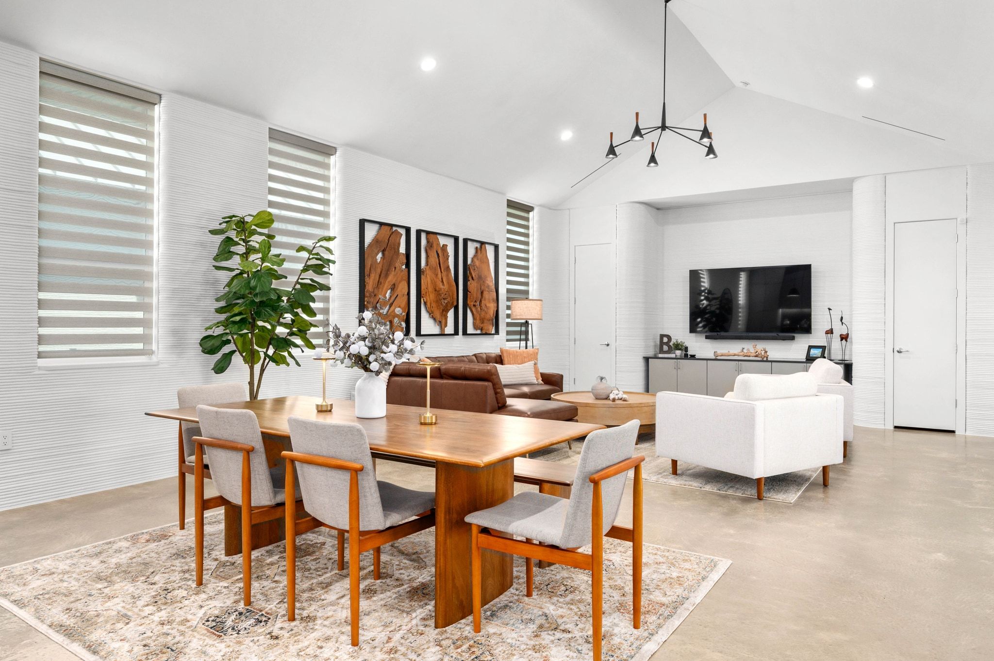 221 Lone Ranger Trail Georgetown, TX 78628 - Photo 10 of 35 a view of a livingroom with furniture and a flat screen tv