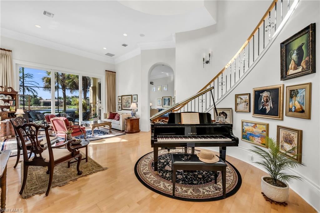 2629 Sorrel Way Naples, FL 34105 - Photo 11 of 43 a living room with furniture and a potted plants